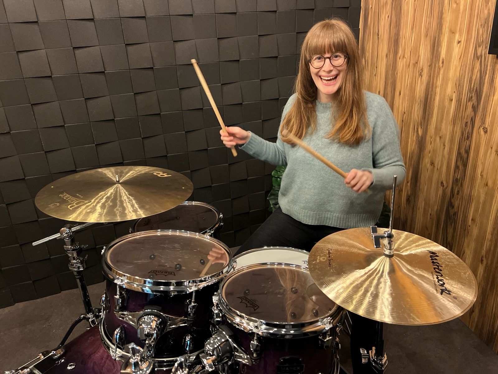 Melanie playing drums